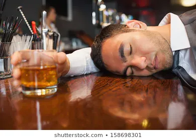 drunk-unconscious-businessman-lying-on-260nw-158698301.webp