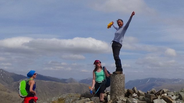 41 Me on trig point with arms up.jpg