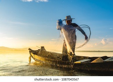 photo-shot-water-spatter-fisherman-260nw-1087043567.jpg