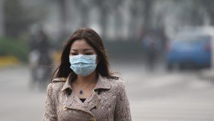 151022135744-smog-woman-mask-pollution-medium-plus-169.jpg