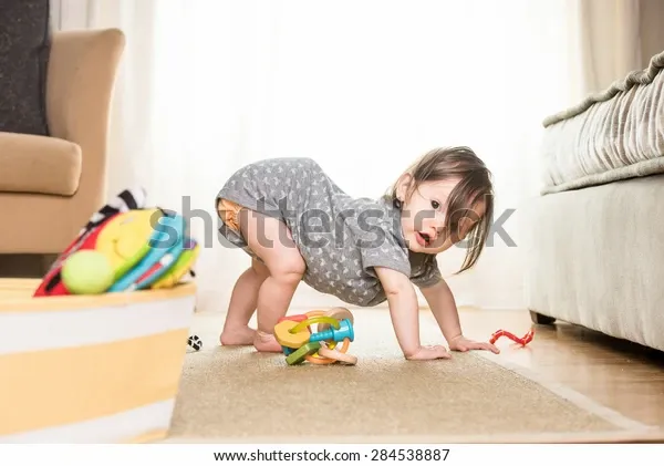 baby-playing-crawling-around-making-600w-284538887.webp