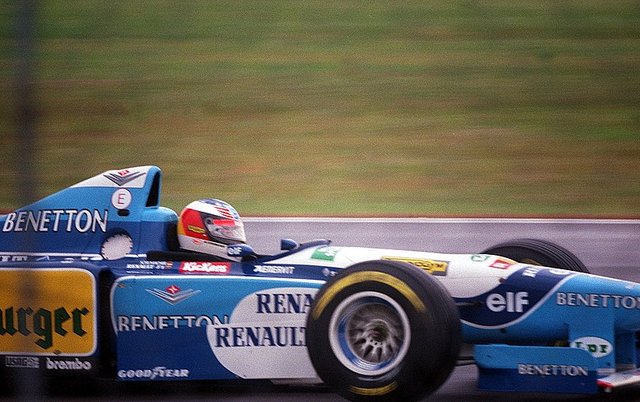 800px-Michael_Schumacher_-_Benetton_B195_at_Silverstone,_British_GP_1995_(49684425236).jpg