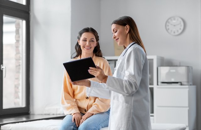 medical-banner-with-doctor-holding-tablet.jpg