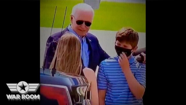 7. Biden Hands His Used Facemask To A Kid (H3S1).jpg