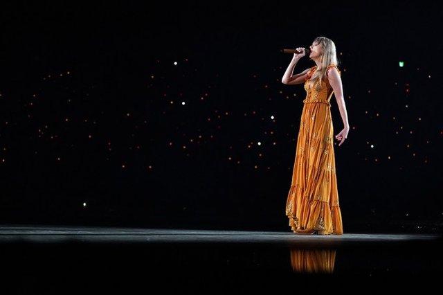 taylor-swift-eras-tour-brown-dress-embed.jpg