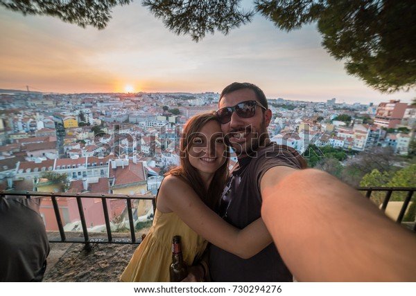 handsome-tourists-couple-take-selfie-600w-730294276.jpg