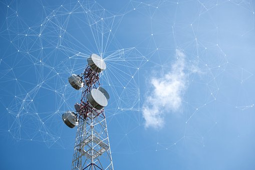 telecommunication-tower-with-mesh-dots-glittering-particles-for-wireless-telecommunication.jpg