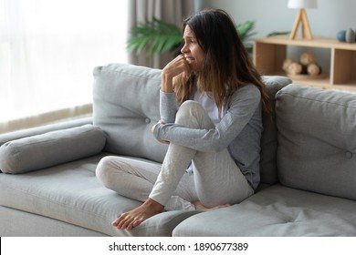 frustrated-unhappy-woman-crying-sitting-260nw-1890677389.jpg