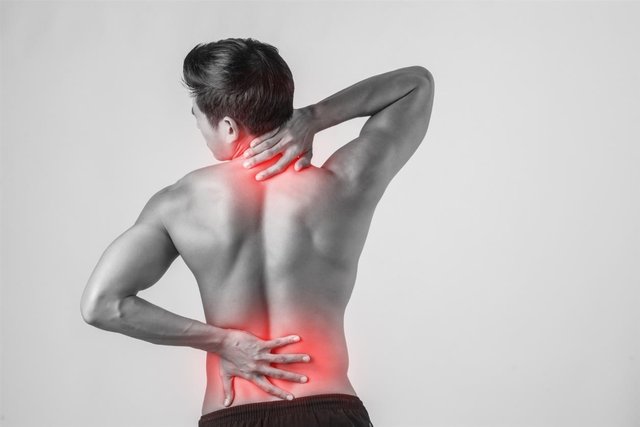 close-up-man-rubbing-his-painful-back-isolated-white-background.jpg