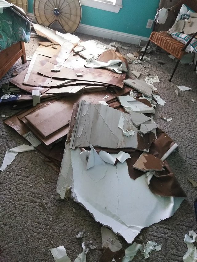 assessments of damage ceiling on the floor florence.jpg