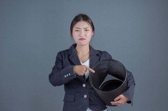 female-business-with-black-trash-showing-gestures_1150-13431.jpg