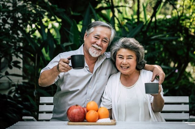 elderly-couples-playing-eating-some-fruit_1150-7844.jpg