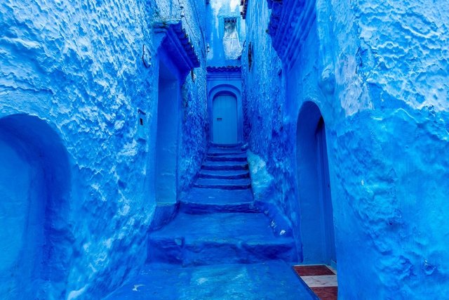 Chefchaouen-Morocco-solid-blue-door-walls-walkway.jpg