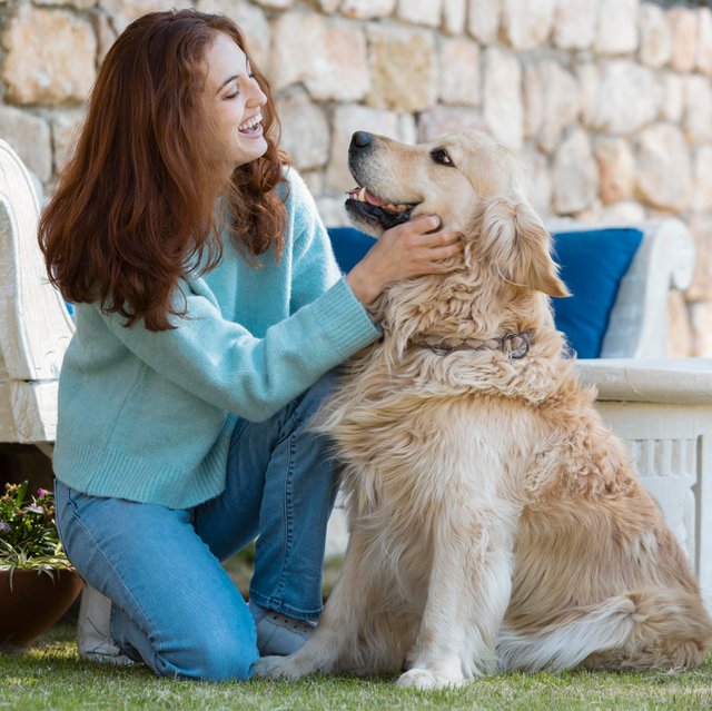 full-shot-woman-with-smiley-dog.jpg