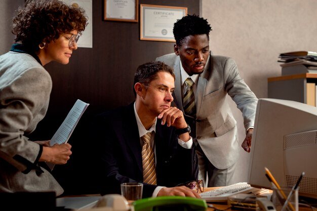 vintage-style-people-working-office-with-computers_23-2149850994.jpg