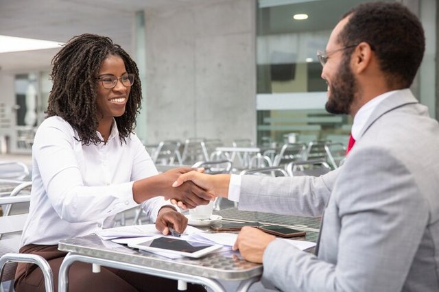 cheerful-businesspeople-reaching-agreement_74855-2628.jpg