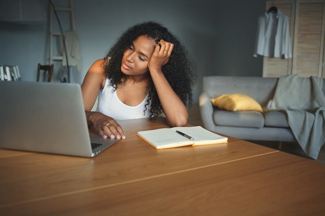 picture-tired-beautiful-young-african-female-student-sitting-desk-with-open-electronic-device-feeling-exhausted-while-prearing-test-people-technology-education-job-occupation_343059-1625.jpg