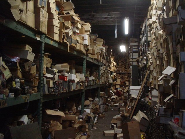 Messy_storage_room_with_boxes.jpg