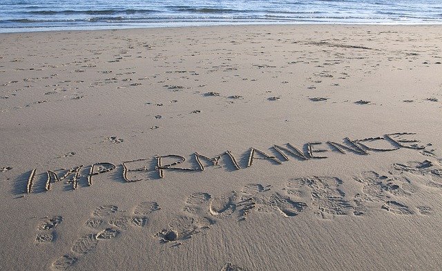 beach with impermanence written in sand.jpg