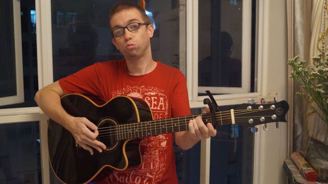 2016-01-01 JA AVATAR GUITAR RED SHIRT JUST ME JOEY ARNOLD IN APARTMENT Q7 HCM AT DARK WINDOW.jpg