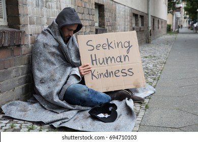male-beggar-hood-showing-seeking-260nw-694710103.jpg
