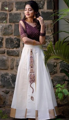 modern-twist-traditional-onam-outfit-embroidered-skirt-v-neck-maroon-blouse.jpg