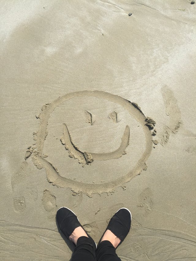 smiley-drawing-on-sand-698899.jpg