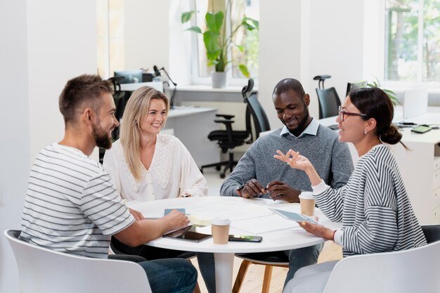 close-up-young-colleagues-having-meeting_23-2149060259.jpg