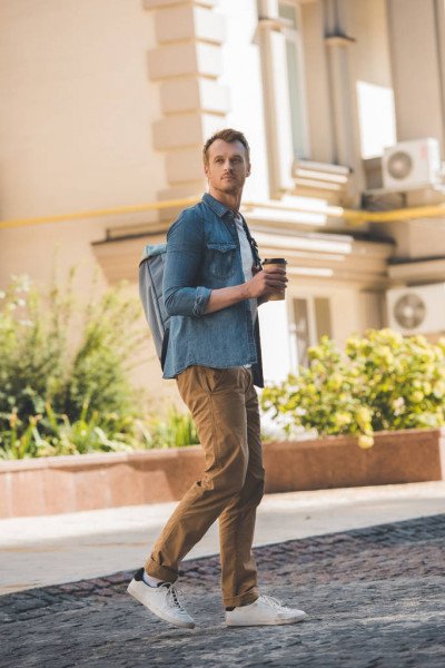 depositphotos_217656812-stock-photo-handsome-young-man-coffee-backpack.jpg