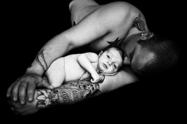 tattooed_man_with_baby-780x521.jpg