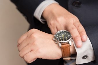 businessman-checking-the-time_1357-97.jpg