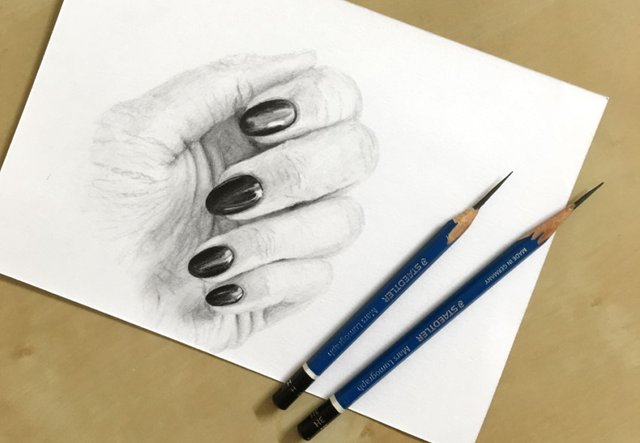 female-hand-pencil-drawing.jpg