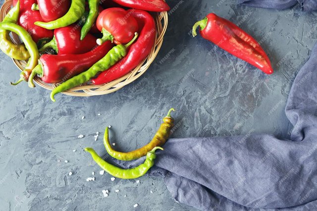 green-red-peppers-wicker-basket-concrete-table-gray-linen-cloth-top-view_380562-961.jpg