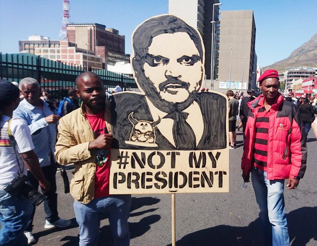 Atul_Gupta_protest_banner_-_Cape_Town_Zuma_must_fall.jpg