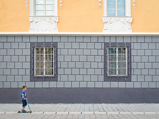 Kid on a scooter