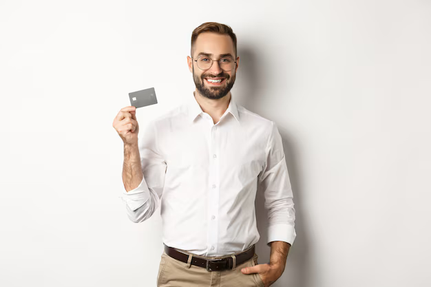handsome-businessman-showing-his-credit-card-looking-satisfied-standing_1258-26465.png