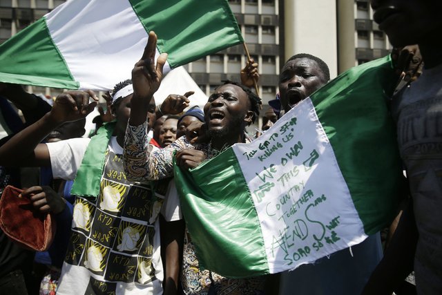 nigeria-sars-police-brutality-protests-movement-001.jpg__2100x1400_q85_crop_subject_location-1050,700_subsampling-2_upscale.jpg