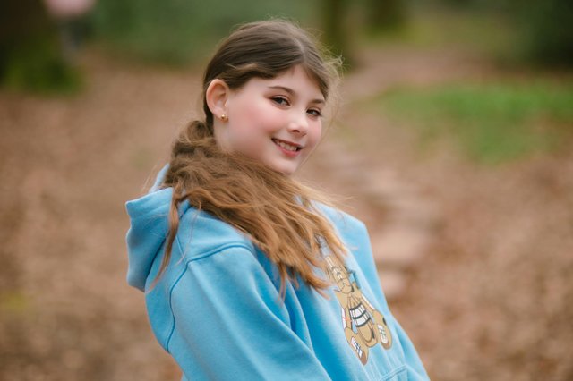 free-photo-of-smiling-girl-in-blue-hoodie-outdoors.jpeg