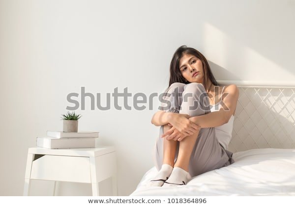 asian-woman-sad-emotion-bedroom-600w-1018364896.jpg