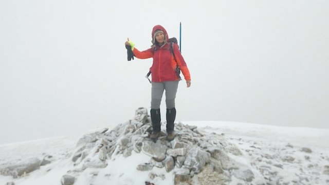 15 Me waving on summit cairn, Sron a' Choire Ghairbh.jpg