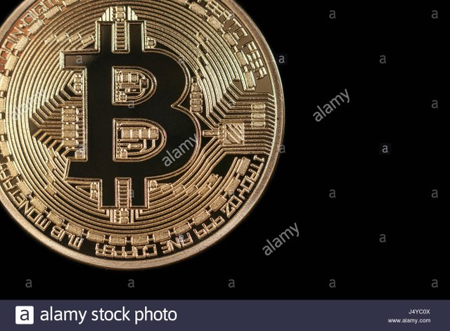 golden-bitcoin-on-black-background-bitcoin-cryptocurrency-J4YC0X.jpg