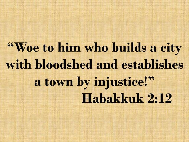 Bible warning. Woe to him who builds a city with bloodshed and establishes a town by injustice! Habakkuk 2,12.jpg