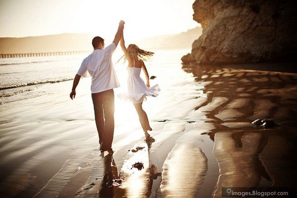 couple-seaside-dance-holding-hand-sunset-romantic-5452.jpg