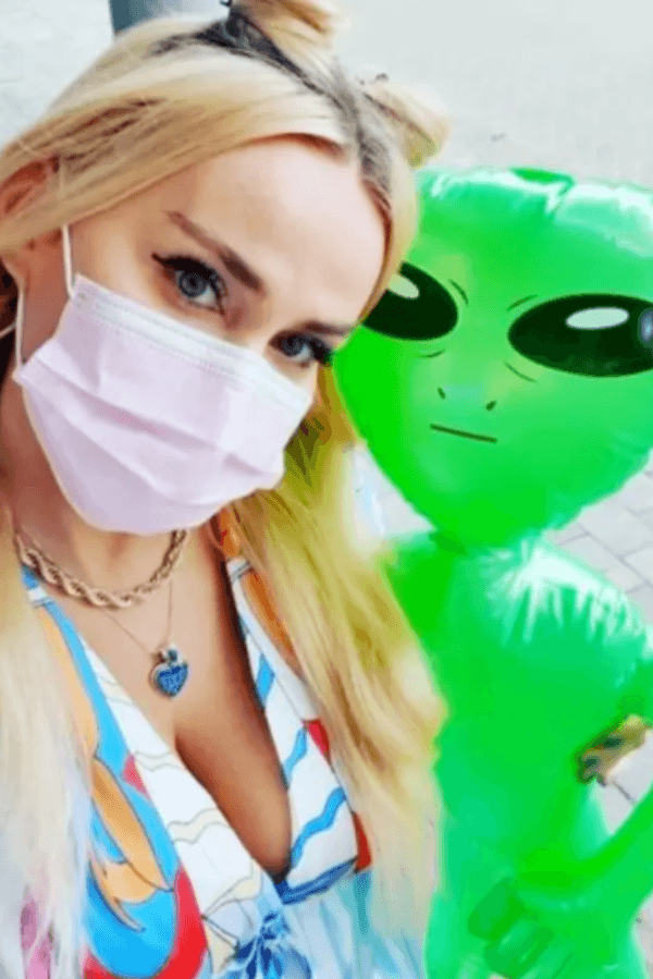 abbie-bela-holding-alien.png