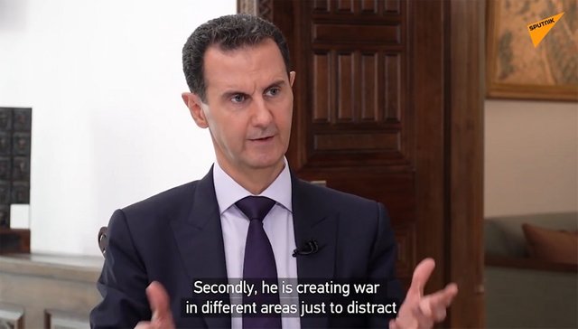 President Assad Interview with Sputnik.jpg