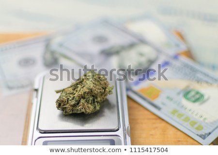sale-weighing-marijuana-bud-on-450w-1115417504.jpg
