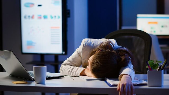 freelancer-working-overtime-project-falling-asleep-desk-with-hand-financial-documents-trying-respect-deadline-employee-using-modern-technology-network-wireless-sleeping-table_482257-13438.jpg