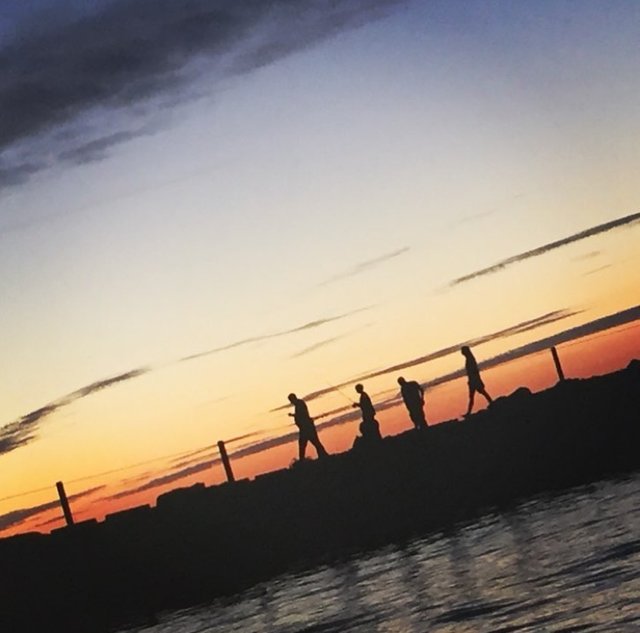 people on pier at sunset.jpg