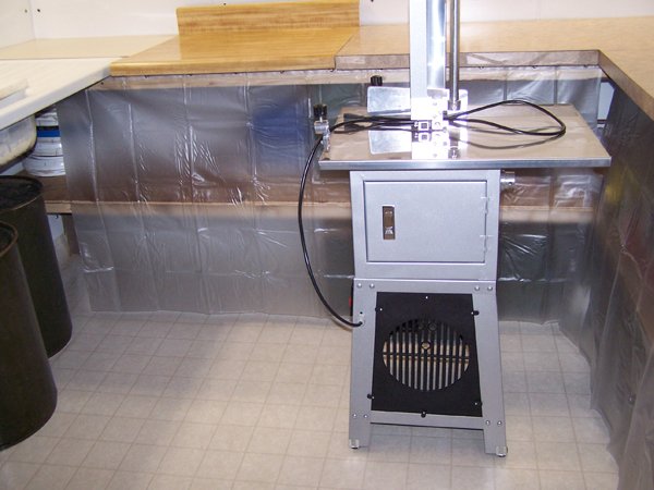 10.Butcher Shop - Bandsaw and under counter storage2 crop Dec. 08.jpg