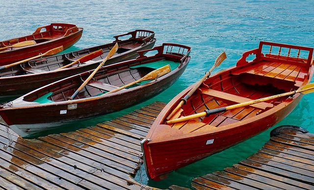 rowing-boats-wooden-boats-boat-water-ship-boats-pier.jpg